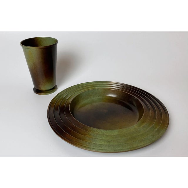 Beautiful set of a Patinated bronze Plate and Vase by Ystad Brons, Sweden, from the 1930s. The plate designed by Ivar...