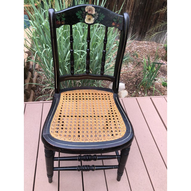 Vintage Hitchcock hand painted with floral and fruit motif, cane seat, spindle accent side chair Great condition for its...