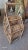 Vintage boho sculptural rattan wine rack. Rack holds 5 bottles or wine and would be great for your countertop.