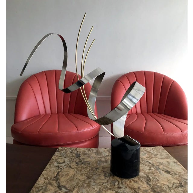 A vintage table top sculpture of an abstract form on a marble pedestal. Crafted by C.Jere and dated to 1978. Very nice...