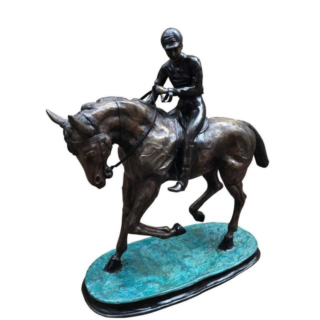 A gorgeous french bronze horse and jockey statue, made from bronze, 20th century. Believed to be a recast from the...