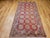 This exquisite 19th-century Khotan rug originates from Eastern Turkestan, a historic crossroads of Silk Road artistry....