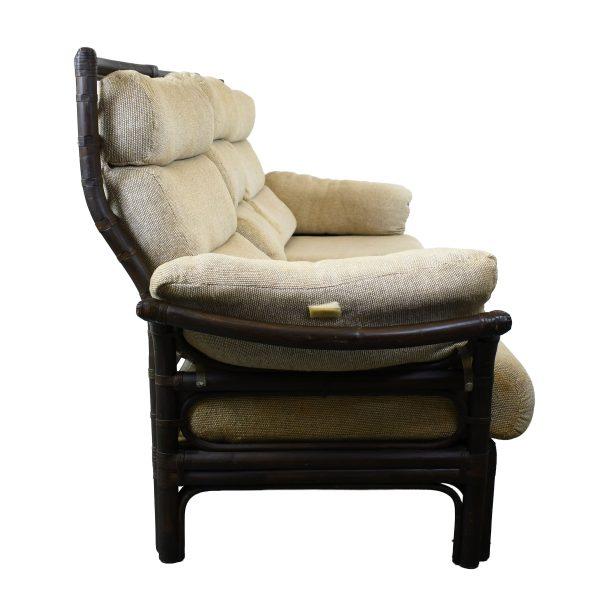 Stunning vintage Brown Jordan rattan sofa in a warm honey finish. The generously scaled frame features woven cane panels...