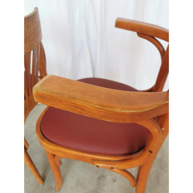 Vintage wooden dining chairs were made in around the 1970s in former Yugoslavia. Made with bentwood technique, which gives...