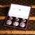 A late 20th century solid silver set of six menu holders, each holder modelled as either a gentleman's top hat & ladies...