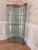 The Oregina curio cabinet by Tonin Casa, designed by Gino Carollo, is a sculptural glass display piece that brings...
