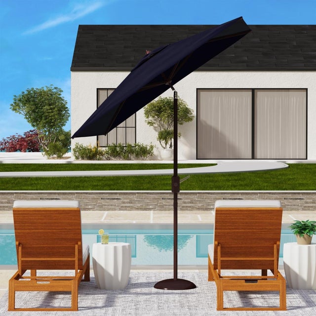 Provide a stylish and shady respite to any outdoor space with our Zimmerman market umbrella. Featuring a square canopy,...