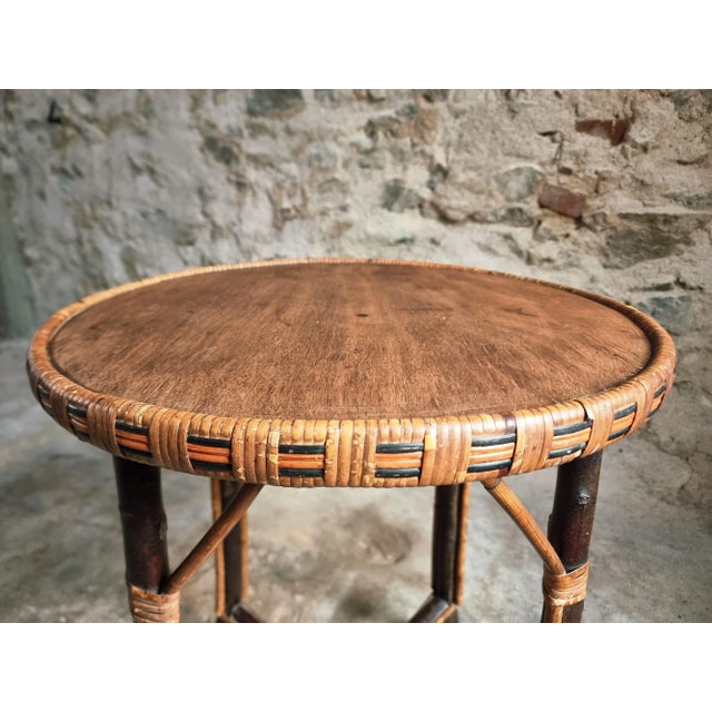 This vintage round side table, crafted in France during the 1950s/70s, reflects the mid-century fascination with natural...