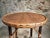 This vintage round side table, crafted in France during the 1950s/70s, reflects the mid-century fascination with natural...