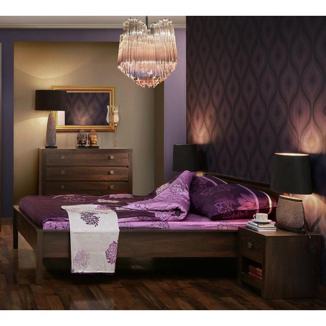 Murano glass chandelie, spiral shape, very elegant, 60 pink quadriedri on nickel metal frame. This Mid- Century Italian...