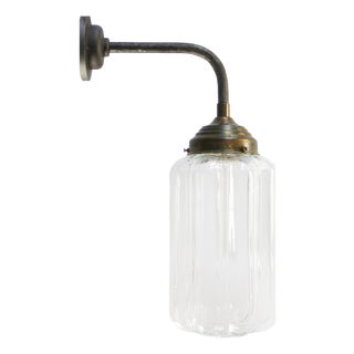 Mid-Century Modern Brass and Cast Iron Sconce in Clear Glass For Sale