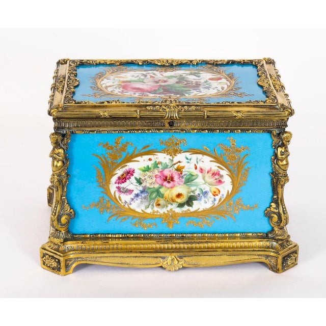 This is a fine large antique French Ormolu and Sevres Porcelain jewellery casket, circa 1860 in date. This magnificent...