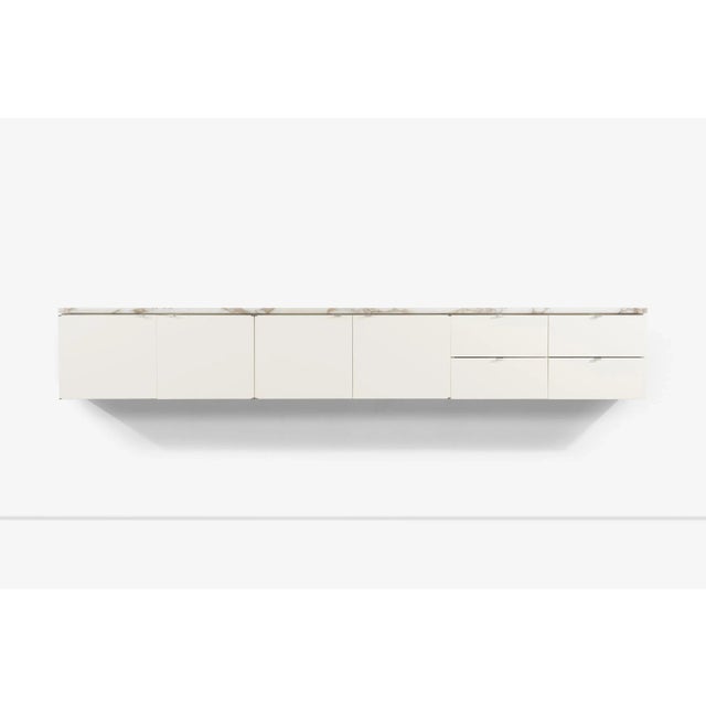 Florence Knoll custom wall-mounted cabinet by Knoll Associates for H.J. Heinz Co, Pittsburgh. This custom wall-mounted...
