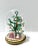 Charming 1970s miniature Christmas tree handcrafted from beads and tiny glass ornaments and displayed beneath a clear...