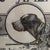 Handsome print, circa 1930s, of "Celebrated Dogs of America". Framed in rustic wood and with hanging wire on reverse....