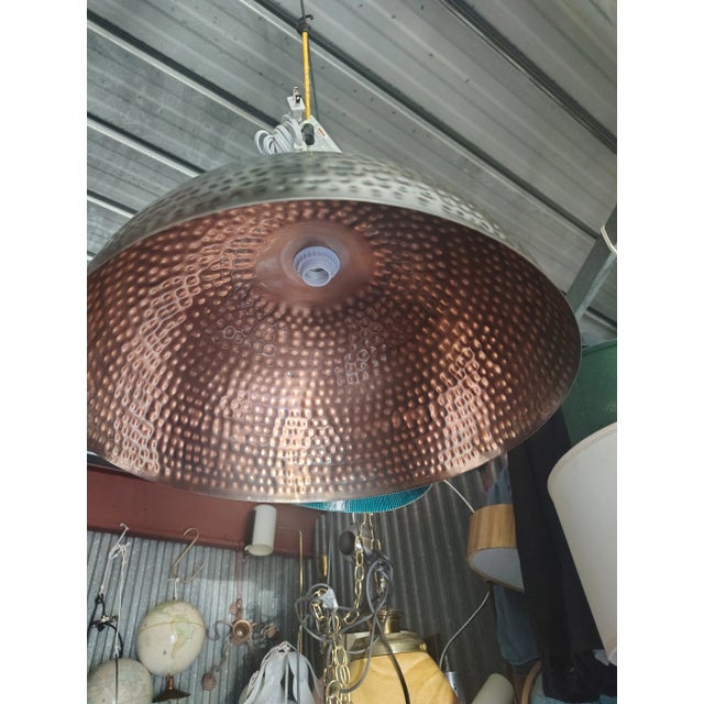 this is a 15" hammered pendant lamp with a 12' plug in cord the switch is also on the cord and a white cord .the lamp has...