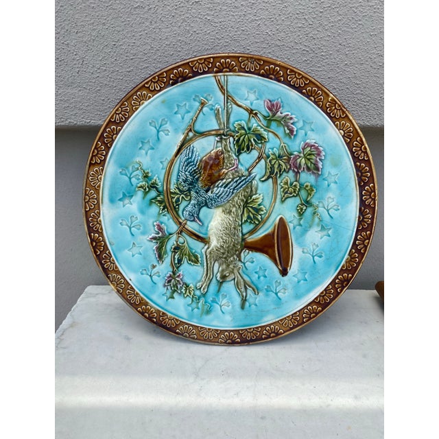 19th Century pair of large Majolica platters with hunting trophies Onnaing. One with an hare , horn and Bird , leaves ,...