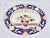 Huge antique ironstone platter. Striking colors and beautiful detailing. Small repair on edge that does not go through....