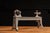 c. 1900s; Peter Austin - Muncie, IN Antique cast iron tabletop manual training lathe with steel hardware. This piece was...