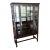 Antique Black Toned Wood Wavy Glass China Display Cabinet For Sale