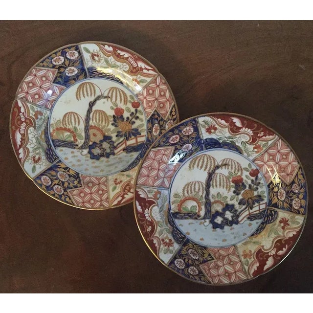 Antique pair Coalport porcelain imari plates decorated in the rock and tree pattern made famous by the Prince Regent at...