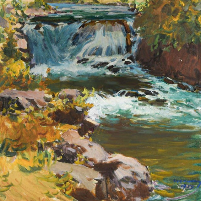 This Framed Signed Gentle Waterfall Painting on Canvas captures the serene beauty of a forest stream cascading softly over...