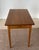 Elegant Thomas Moser end table in solid cherry featuring a single drawer and refined minimalist design. This piece notable...