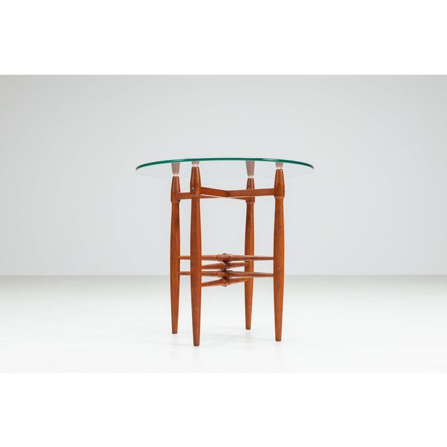 Poul Hundevad side table in teak, manufactured by Vamdrup Stolefabrik, Denmark, 1960s. A beautifully sculptural Danish...