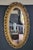 Early 1900s French Style Hand Carved Gilded Oval Beveled Wall Mirror For Sale - Image 4 of 12
