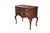 This handsome 20th-century Queen Anne style lowboy chest is meticulously crafted from solid cherry wood, showcasing a...