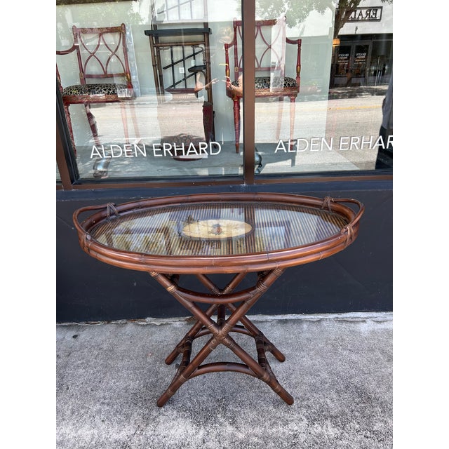 Handsome vintage tray table or bar with a removable bamboo oval top on a bamboo base with reed wrapped joints and...