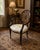 This elegant spider back armchair is most likely an authentic Ethan Allen piece, crafted in the refined Hepplewhite...