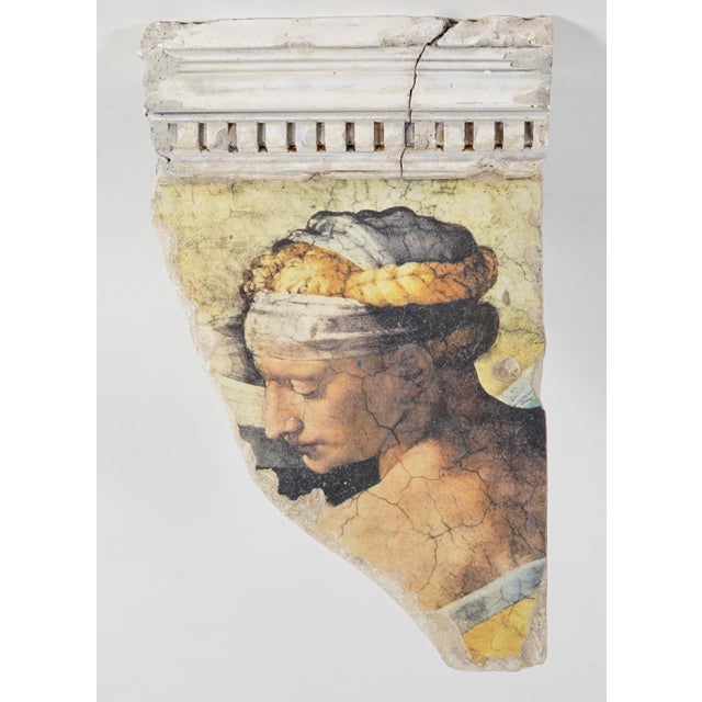 Wall art plaque bearing the reproduction of aancient greek figure of the Sistine Chapel. The reproduction painting...