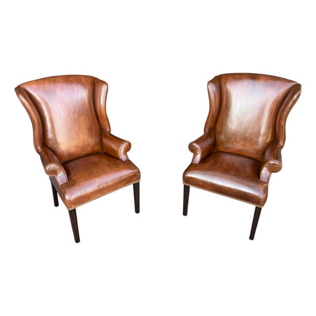 Pair of Vintage Cognac Leather Wingback Chairs With Louis XVI–Style Fluted Legs For Sale