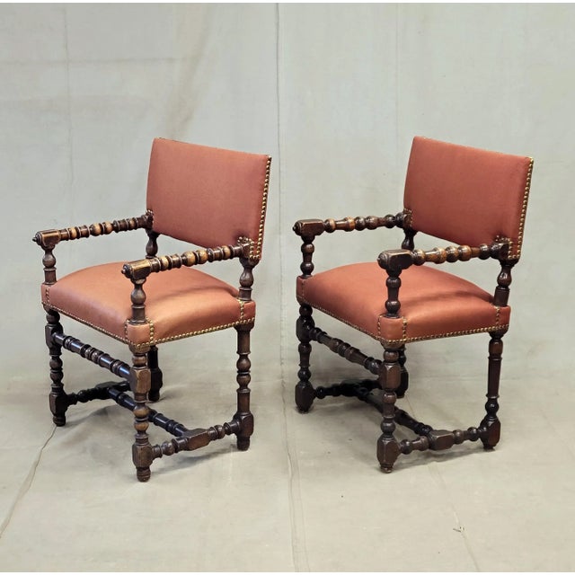 A beautiful pair of antique early 20th century European, perhaps Italian, chairs with modern upholstery in a rich...