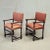 A beautiful pair of antique early 20th century European, perhaps Italian, chairs with modern upholstery in a rich...