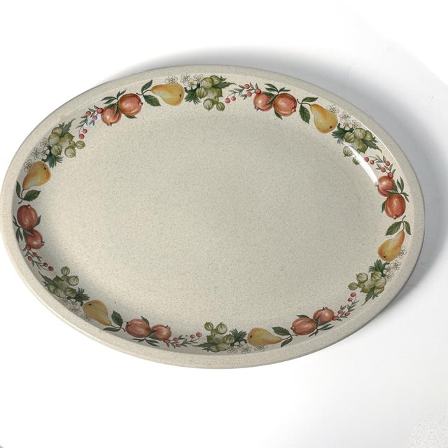 A handsome pair of large vintage oval serving platters in Wedgwood’s discontinued Quince pattern, made in England as part...