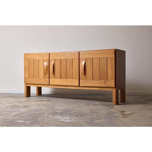 Frech Sideboard in Elm from Maison Regain, 1970s, in Very Good conditions. Designed 1970 to 1979 I have official proof of...