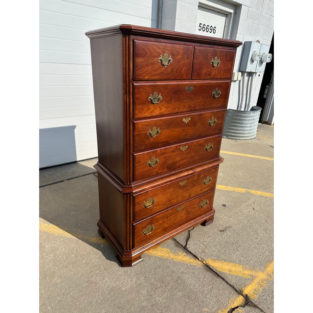 The American Craftsman’s Collection by Stanley mahogany chest of drawers. Six dovetailed drawers with classic brass...