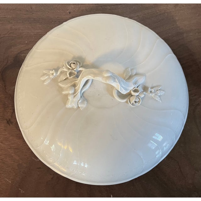 Antique 19th century KPM Berlin porcelain blanc de Chine round soup tureen and cover with prunus branch and floral...