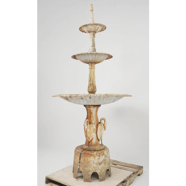 Late 19th century three tier cast iron fountain made by J.W. Fiske in New York. The base has three standing storks, their...