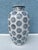Vintage pair of Tall flower vase featuring a blue pad print medallion pattern. Measures 16” tall with a 9.5” diameter at...