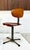 This rare workshop chair from the 1930s combines the functional aesthetic of early industrial workplaces with the quality...