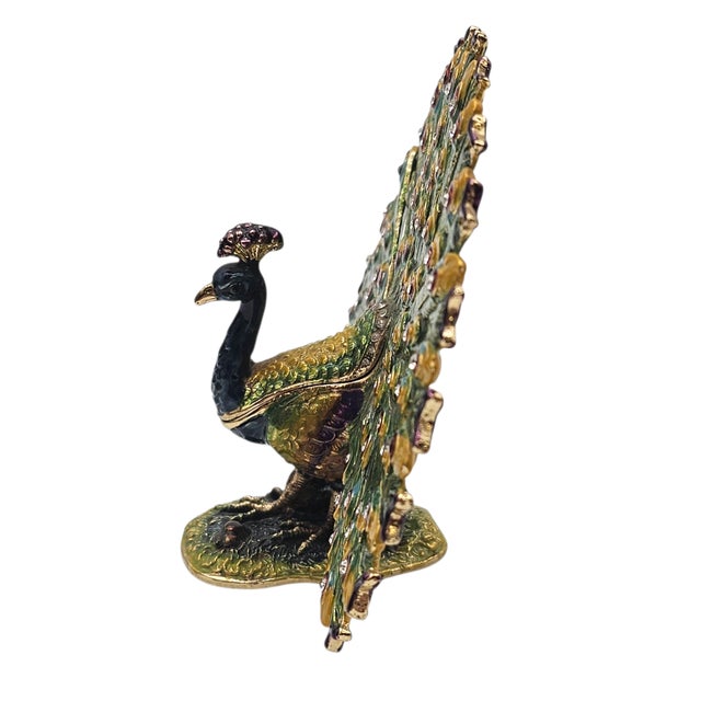This small figural trinket box is cast in zinc-alloy metal and finished with hand-applied enamel and rhinestone...