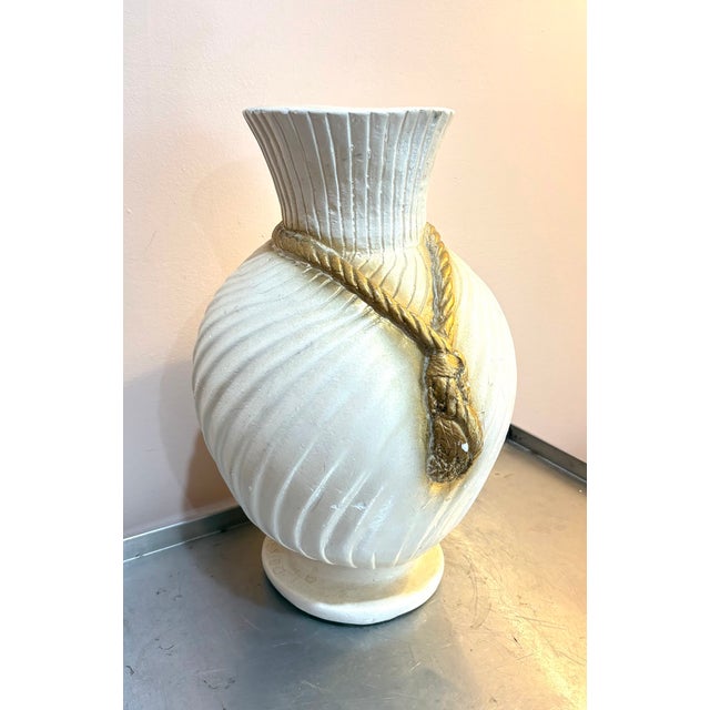 1970s-80s cream/gold rope & tassel large plaster vase. A couple of small surface chips and scratches as shown. Otherwise...