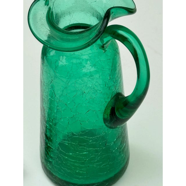 Beautiful teal / emerald green crackle art glass crust with stopper - excellent vintage condition. Overall 6” high with...