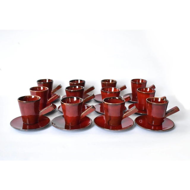 A set of vintage, mid-century Scandinavian modern 12 cups or small mugs and 12 saucers, Swedish, for glögg (mulled wine)....