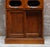 An exceptional vintage English haberdashery shop display cabinet by Dudley & Co, dating to circa 1940 and retaining an...