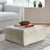 A bold and luxurious statement piece, this large square ottoman is upholstered in natural cowhideenhanced with elegant...