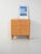 Compact birch chest of drawers with four drawers, relief-carved handles, and geometric proportions. Elegant Scandinavian...